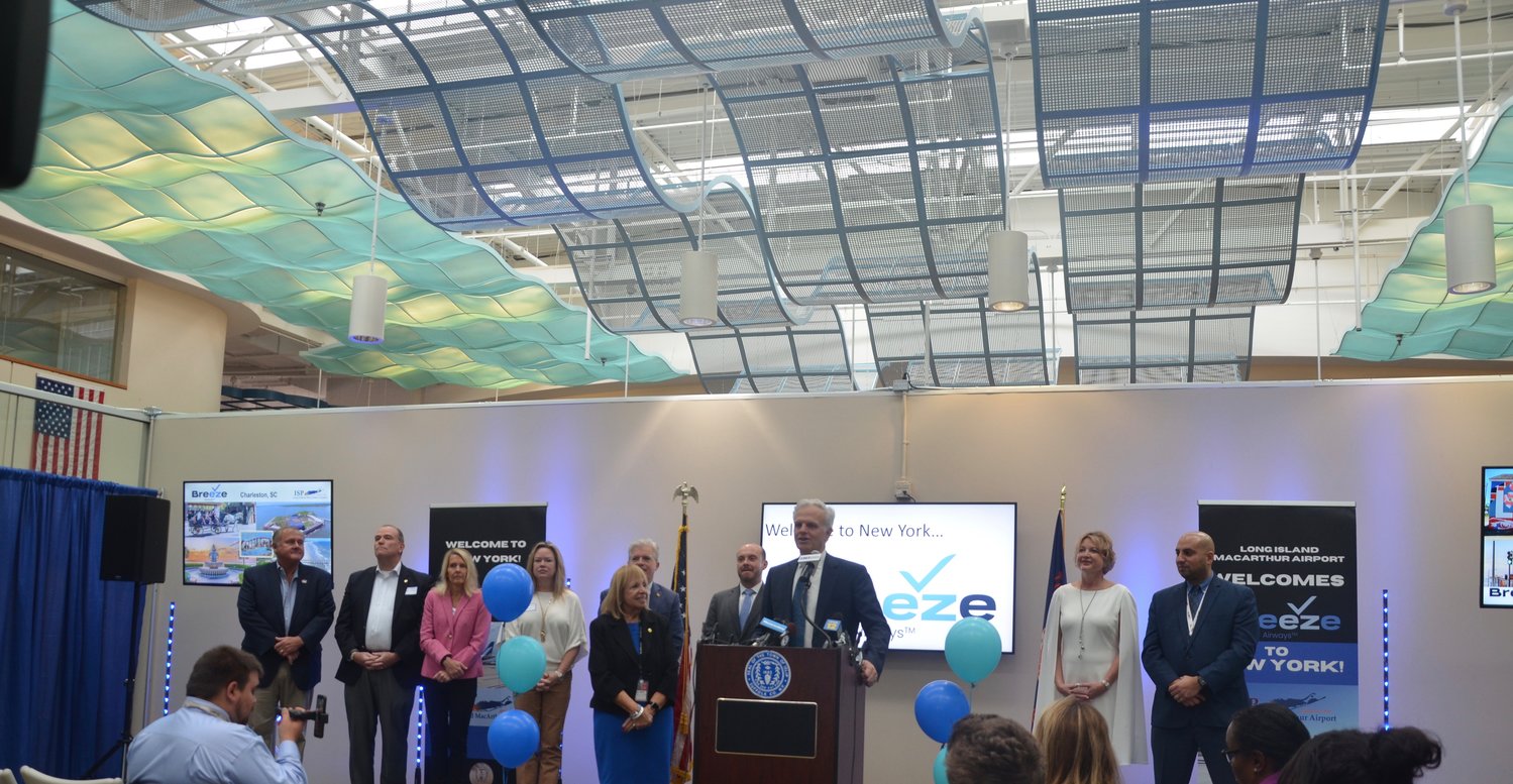 David Neeleman, chairman and CEO of Breeze Airways, speaks at the press conference announcing their partnership with Long Island MacArthur Airport.